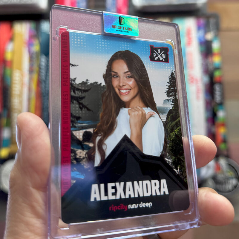 custom trading card inside a hard card case with custom sticker